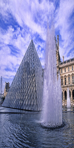 Paris Louvre Museum and iconic glass pyramid